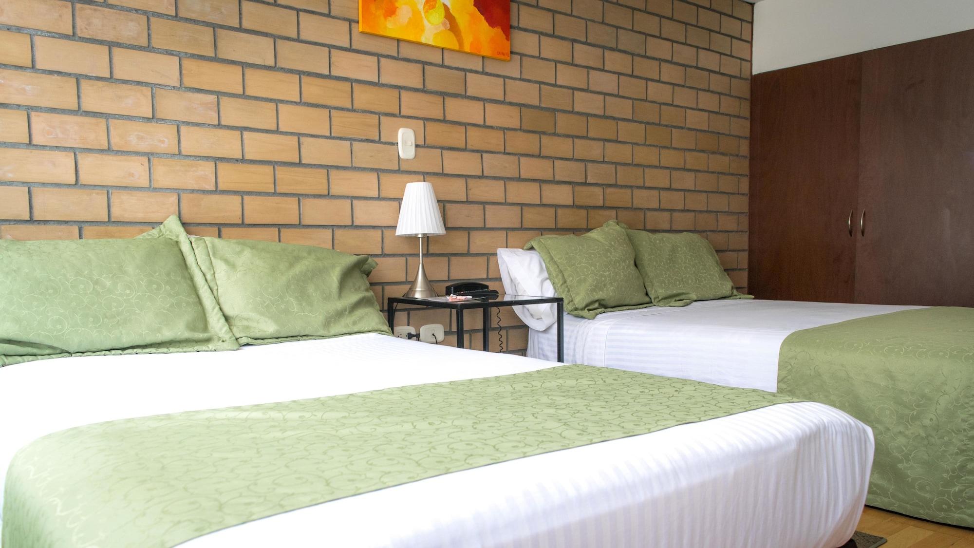 Hotel Portal De Milan 马尼萨莱斯 外观 照片