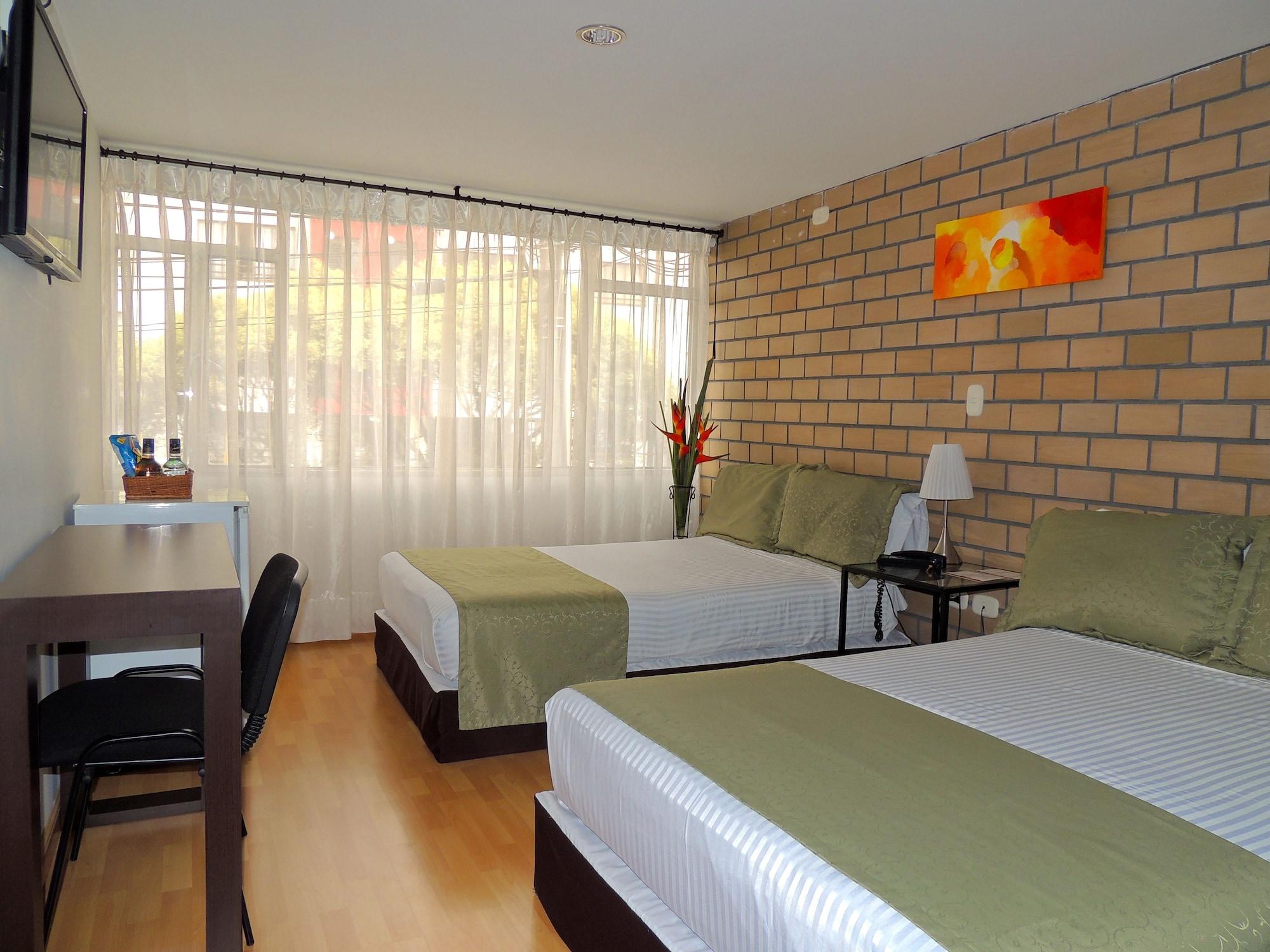 Hotel Portal De Milan 马尼萨莱斯 外观 照片