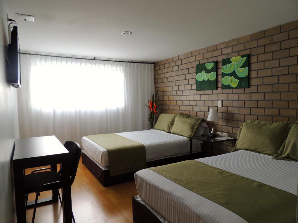 Hotel Portal De Milan 马尼萨莱斯 客房 照片